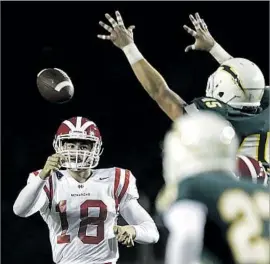  ?? Robert Gauthier Los Angeles Times ?? J.T. DANIELS (18) has completed 81% of his passes for 2,640 yards and 40 touchdowns at Mater Dei. And the sophomore has only had two passes intercepte­d.