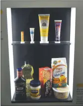  ?? ?? A display of various products that contain canola oil.