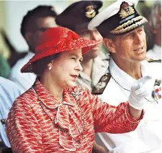  ?? ?? Queen Elizabeth and the Duke of Edinburgh in Kiribati, a Commonweal­th country, in 1982