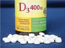  ?? [AP FILE PHOTO] ?? Vitamin D pills are displayed Nov. 9, 2016, in New York.