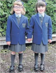  ??  ?? Smiles Burnside Primary twins Emma and Rachel MacLeod.