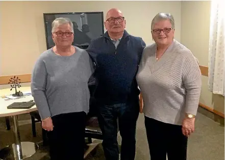  ?? ?? Volunteer siblings Josephine, Anthony and Bernadette feel privileged that they can help people in their time of need.