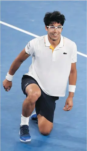  ?? — GETTY IMAGES ?? South Korea’s Hyeon Chung celebrates after his victory over Serbia’s Novak Djokovic in their men’s singles fourth-round match at the Australian Open in Melbourne Monday.