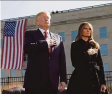  ?? REUTERS PIC ?? US President Donald Trump and First Lady Melania Trump attending the 9/11 observance at the National 9/11 Pentagon Memorial in Arlington, Virginia, yesterday .