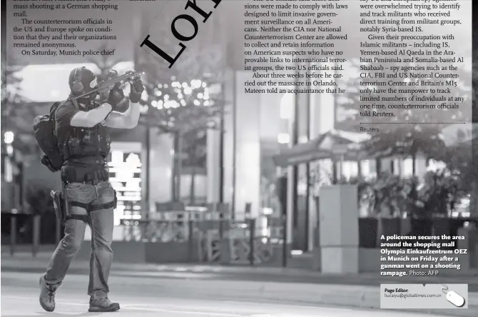  ?? Photo: AFP ?? A policeman secures the area around the shopping mall Olympia Einkaufzen­trum OEZ in Munich on Friday after a gunman went on a shooting rampage.