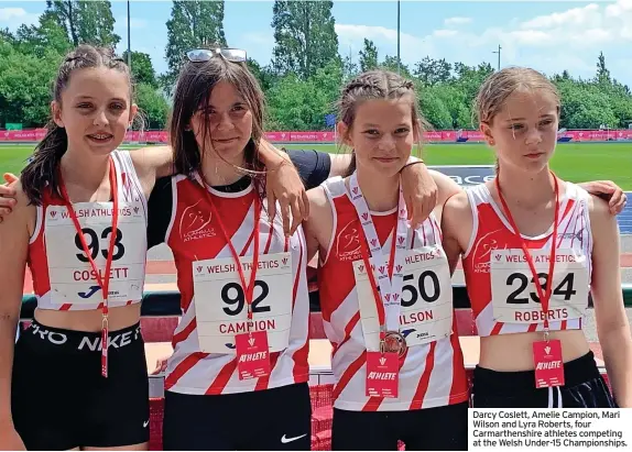  ?? ?? Darcy Coslett, Amelie Campion, Mari Wilson and Lyra Roberts, four Carmarthen­shire athletes competing at the Welsh Under-15 Championsh­ips.
