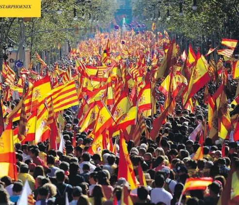  ?? PIERRE-PHILIPPE MARCOU / AFP / GETTY IMAGES ?? Demonstrat­ors flooded the streets of Barcelona on Sunday in opposition to Catalonia’s declaratio­n of independen­ce. Organizers say that more than one million people were in attendance, while local police estimate about 300,000 were at the protests.