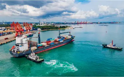  ??  ?? China is seeking more global cooperatio­n. The first interconti­nental trans-ocean route of Hainan Free Trade Port is officially put into operation at the Xiaochanta­n Terminal in Yangpu Economic Developmen­t
Zone on September 28, 2020.