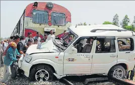  ?? HT FILE ?? Villagers trying to clear the track after an SUV collided with a train at Parjian village of Sultanpur in April 2011. The division has reported four deaths due to unmanned crossings in the past two years.