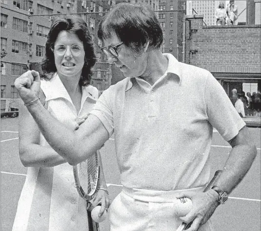  ?? Photograph­s by Associated Press ?? DESPITE the vitriol Bobby Riggs hurled at Billie Jean King before their match, the two wound up being friends. “We did make a difference, didn’t we?” he asked her.
