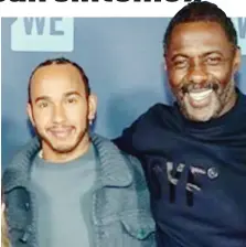  ??  ?? Lewis Hamilton due settimane fa con l’attore Idris Elba, risultato positivo