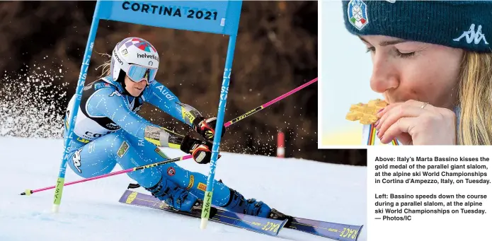  ??  ?? Above: Italy’s Marta Bassino kisses the gold medal of the parallel giant slalom, at the alpine ski World Championsh­ips in Cortina d’Ampezzo, Italy, on Tuesday.
Left: Bassino speeds down the course during a parallel slalom, at the alpine ski World Championsh­ips on Tuesday. — Photos/IC