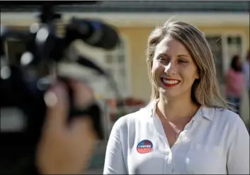  ?? AP PhOtO/MArcIO JOSe SAnchez ?? In this 2018 file photo, Katie Hill, then a Democratic Party candidate from California’s 25th Congressio­nal district, talks to a reporter after voting in her hometown of Agua Dulce, Calif.
