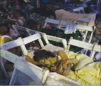  ?? "1 1)050 ?? Residents of a zone heavily damaged by Thursday’s magnitude 8.1 earthquake spend a third night sleeping outside in central Juchitan, Mexico. Mexico’s government is distributi­ng food to jittery survivors of an earthquake while residents have continued...