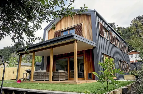  ?? STACY SQUIRES/STUFF ?? The simple form of this new Christchur­ch PassivHaus helps keep it comfortabl­e and energy efficient. New Zealand houses generally lose a lot of heat.