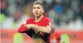  ?? AFP ?? Firmino entró a resolver el juego para los ingleses.