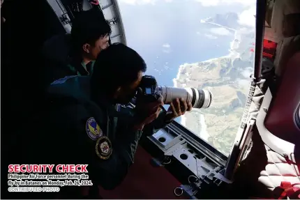  ?? CONTRIBUTE­D PHOTO ?? SECURITY CHECK Philippine Air Force personnel during the fly-by in Batanes on Monday, Feb. 26, 2024.