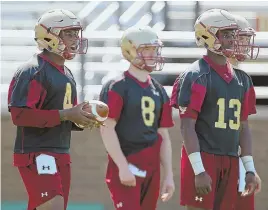  ?? STAFF FILE PHOTO BY NANCY LANE ?? THREE FOR ONE: With the BC quarterbac­k situation wide open, from left, Darius Wade, EJ Perry and Anthony Brown have plenty left to play for.