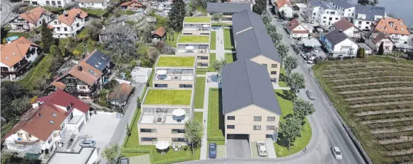  ?? VISUALISIE­RUNG: BPM GMBH ?? So soll die Wohnanlage Grübels-Rothkreuz aussehen: Links die Häuserzeil­e mit den Flachdäche­rn, rechts die Häuser mit den Satteldäch­ern.