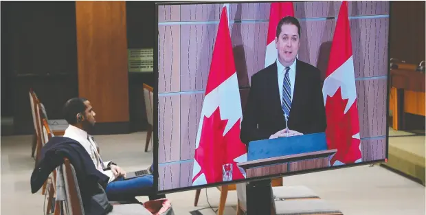  ?? Adrian Wyld / The Canadian Pres ?? Andrew Scheer, seen during a news conference in Ottawa on Thursday, “turtled” when asked to denounce comments by Derek Sloan.