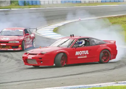  ??  ?? Luis Gono and his 470-hp turbocharg­ed Nissan Silvia S13 in action at the Clark Internatio­nal Speedway