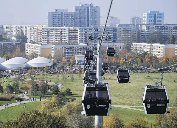  ?? BRITTA PEDERSEN/AFP ?? Edmonton is considerin­g gondolas as a modern source of transporta­tion, similar to the ones in Berlin, above.