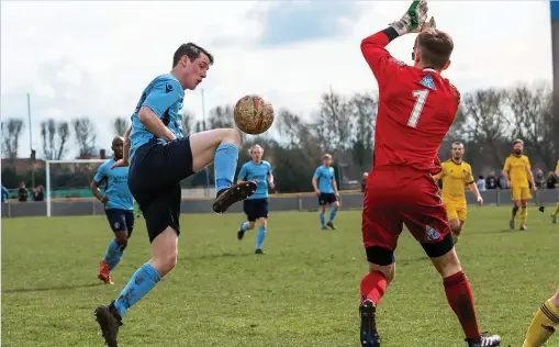  ?? FJA PHOTOGRAPH­Y ?? ● Runcorn Town striker Craig Cairns scored his fifth goal in as many games at the weekend