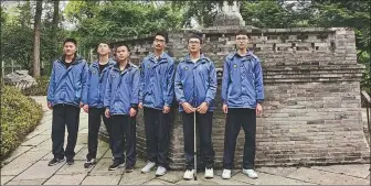  ?? PROVIDED TO CHINA DAILY ?? Zhou Tong (second from right) and his classmates at a park in Huoqiu county, Anhui province.