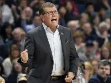  ?? JESSICA HILL — THE ASSOCIATED PRESS ?? Connecticu­t head coach Geno Auriemma calls out at player Katie Lou Samuelson during the second half of a regional semifinal game against UCLA in the NCAA women’s college basketball tournament, Saturday in Bridgeport, Conn.