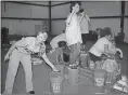  ?? File, Diane Wagner / RN-T ?? Romans pack emergency supplies as part of Hurricane Harvey relief efforts.