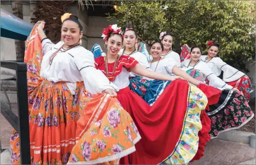  ?? LOANED PHOTOS/ERIC CASTANOS; LOANED GRAPHIC (BELOW) ?? MEMBERS OF THE KOFA FOLKLORIC DANCE CLUB don costumes that reflect the regions represente­d in the dances they perform.