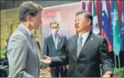  ?? REUTERS ?? Canada’s PM Justin Trudeau (left) speaks with China’s President Xi Jinping at the G20 summit in Bali, on Wednesday.