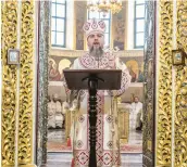  ?? BRENDAN HOFFMAN/THE NEW YORK TIMES ?? Metropolit­an Epiphanius leads the Christmas liturgy Saturday at the Holy Dormition Cathedral in Kyiv, Ukraine.