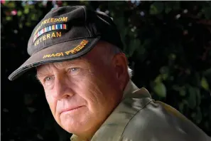  ?? Howard Lipin/San Diego Union-Tribune/TNS ?? ■ U.S. Army Chaplain Col. Robert Blessing (Ret.), an Episcopal priest, suffers from PTSD after two combat tours in Iraq. He helps other combat veterans as part of his healing process.