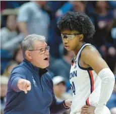  ?? CLOE POISSON/SPECIAL TO THE COURANT ?? Uconn head coach Geno Auriemma instructs Uconn’s Ayanna Patterson during a break in the second half against Xavier on Monday at Gampel Pavilion in Storrs. The Huskies won 60-51.
