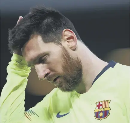  ??  ?? 2 Lionel Messi cuts a dejected figure during Barcelona’s Champions League semifinal defeat by Liverpool at Anfield. The Spanish champions can seal a second straight domestic double when they face Valencia tomorrow in the Copa del Rey final.
