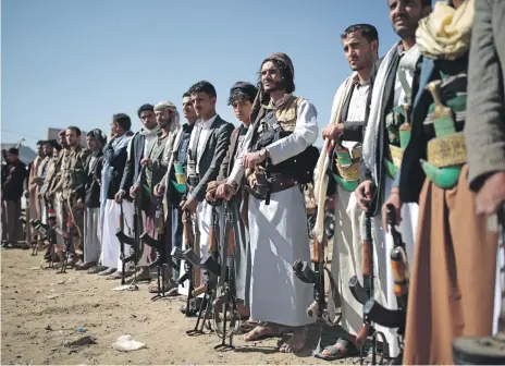  ?? AP ?? Tribesmen loyal to Houthi rebels attend a gathering on Thursday to show their support for the peace talks held in Sweden