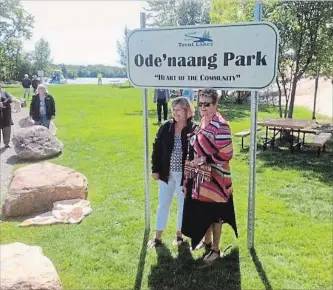  ?? SPECIAL TO THE EXAMINER ?? Trent Lakes Mayor Bev Matthews and Curve Lake Chief Phyllis Williams come together to officially open Ode’ naang Park on the waterfront in Buckhorn.