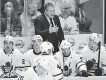  ??  MARK HUMPHREY/THE ASSOCIATED PRESS ?? Maple Leafs’ head coach Peter Horachek talks to his players. The Leafs are trying to focus on the present while the future holds a major makeover and trades.