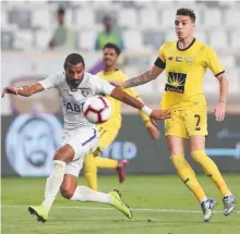  ?? Courtesy: AGL ?? Al Ain’s Mohammad Gharib takes on Al Wasl’s Caio Correa in President’s Cup Last 16, which Al Ain lost 5-3.