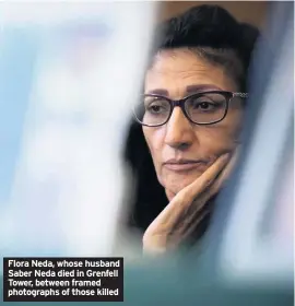  ?? PHOTO: MY LONDON ?? Flora Neda, whose husband Saber Neda died in Grenfell Tower, between framed photograph­s of those killed