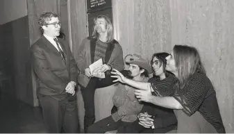  ?? Gordon Peters / The Chronicle 1968 ?? Above, Brian Rohan confers with his clients at S.F. Superior Court after a drug bust at the Grateful Dead’s house. Left, Rohan in 2019.