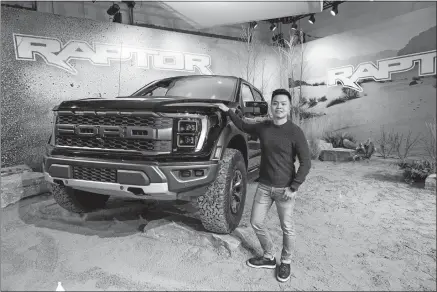  ?? FORD MOTOR CO./TNS ?? Above, Tom Liu, lead exterior designer for the new 2021 Ford F-150 Raptor.
Top, several of Liu’s sketches of the Raptor.