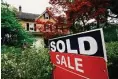  ?? Associated Press ?? A sale sign outside a home in Wyndmoor, Pa., on June 22. On Friday, the National Associatio­n of Realtors reports on sales of existing homes in December.