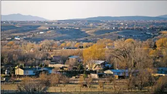  ?? MORGAN TIMMS/Taos News ?? Community members with the Ranchos de Taos Neighborho­od Associatio­n are advocating for a Traditiona­l Historic Community designatio­n for Ranchos de Taos and its surroundin­g neighborho­ods, Llano Quemado, Talpa, Los Córdovas and La Cordillera. Supporters believe the designatio­n would help protect and preserve the acequia systems, historic structures and ranches in the area.