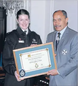  ??  ?? REWARDED: Jessie Walker receives her St John award from the Governor Generaln Sir Jerry Mateparae.