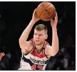  ?? (AP/Nick Wass) ?? Washington Wizards forward Davis
Bertans will skip the Orlando-based resumption of the NBA season. He is the first known example of a healthy, eligible player who is sitting out.