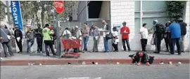  ??  ?? PEOPLE LINE up to vote April 6 on the skid row council proposal. Online voting was also permitted, although it is banned in neighborho­od council races citywide.