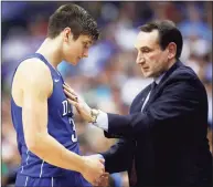  ?? Alex Brandon / Associated Press ?? Duke guard Grayson Allen talks with coach Mike Krzyzewski during the second half in the Atlantic Coast Conference tournament against Notre Dame in 2016.