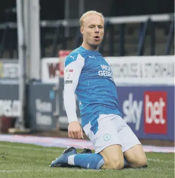  ?? ?? Ryan Broom after scoring for Posh last season.